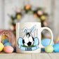 Mug with a soccer ball design featuring bunny ears and the name 'Louis', surrounded by Easter eggs.
